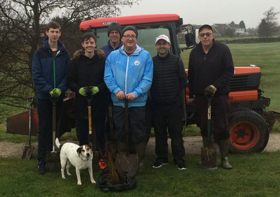 Councillor Kelly and the group planting the trees