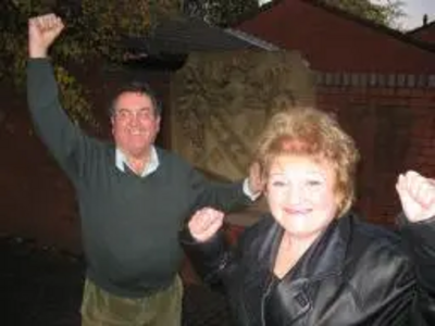 Peter and Doreen celebrate devolution to Heywood.