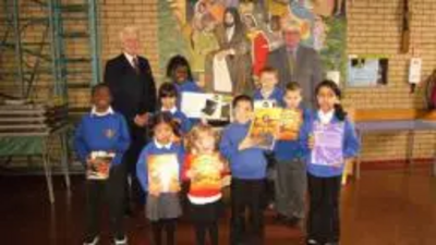 Paul Rowen MP, Headteacher Jed Morgan and some of the ST John’s pupils.