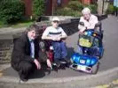 Councillor David Clayton alongside local residents Reggie Lane and Leslie Taylor