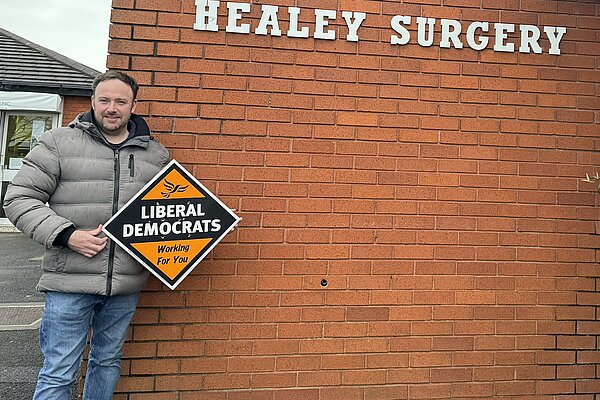 Andy Lord outside Healey Surgery