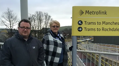 Rochdale Lib Dem leader Andy Kelly, together with Irene Davidson, at the affected Metrolink