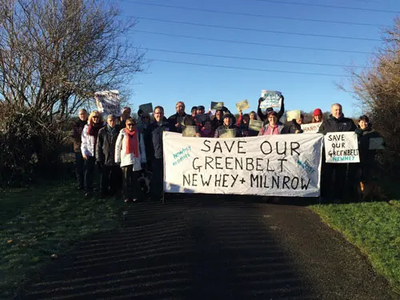 Protesters from Newhey start their march at the Hopwood Arms Pub