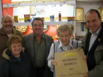 Simon Hughes MP alongside Councillors Peter Rush, Doreen Brophy-Lee, Malcolm Bruce and Heywood stall holder Iris.