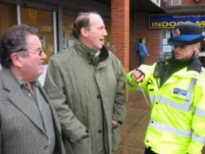 Liberal Democrat Presdent Simon Hughes MP alongside Councillor Peter Rush and local PSCO Julie