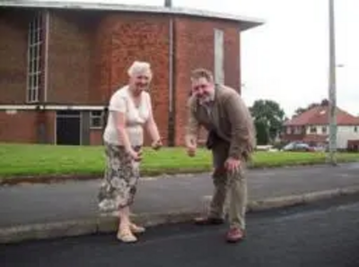 Balderstone and Kirkholt Councillors Dale Mulgrew and Pat Colclough on Queen Victoria Road