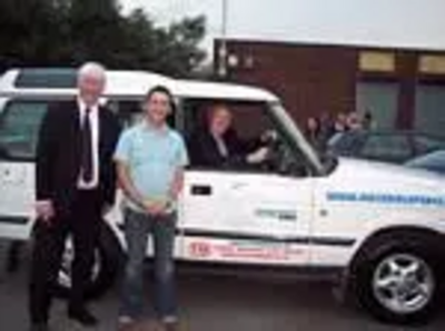 IN THE HOTSEAT - Sir Menzies Campbell MP drives the peace wagon with Peace Campaigner John Farrington and Paul Rowen MP.